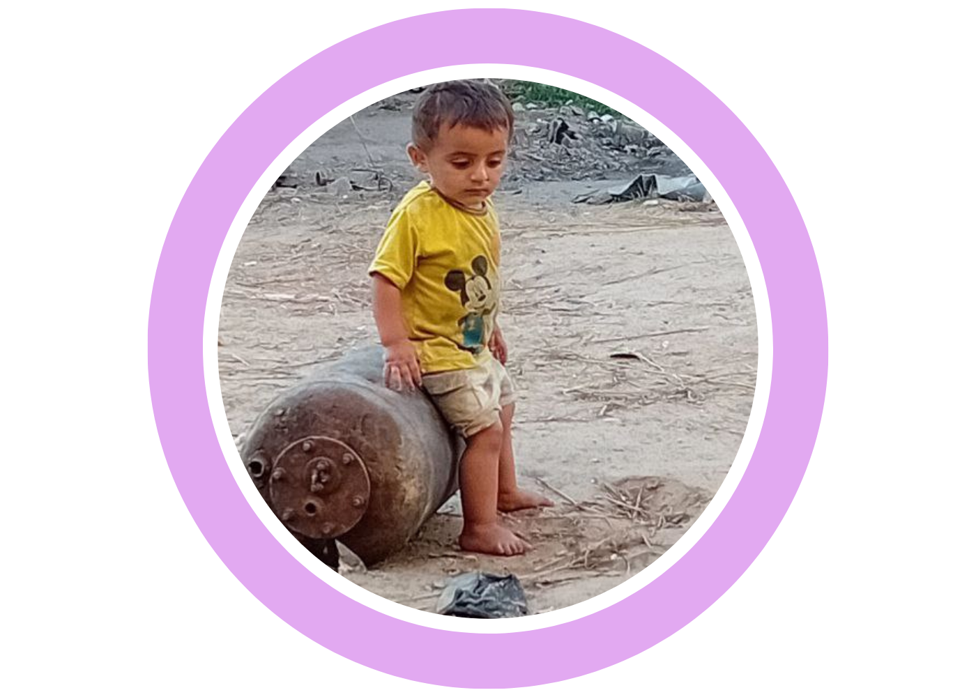 Aseel’s young child outdoors