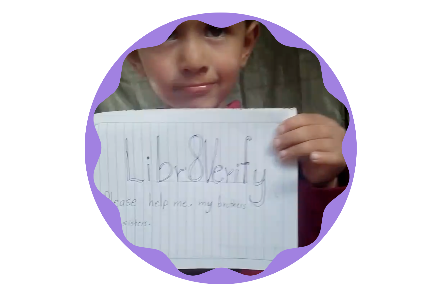 A child in Umm Hanin’s family holding a handwritten message